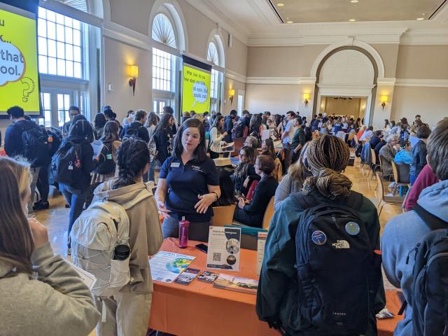 A view of the crowd at the 2022 fair, with lots of students perusing tables