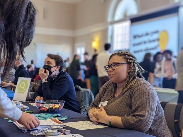 a peer advisor talks to a student about the Career Center's resources at the 2022 event